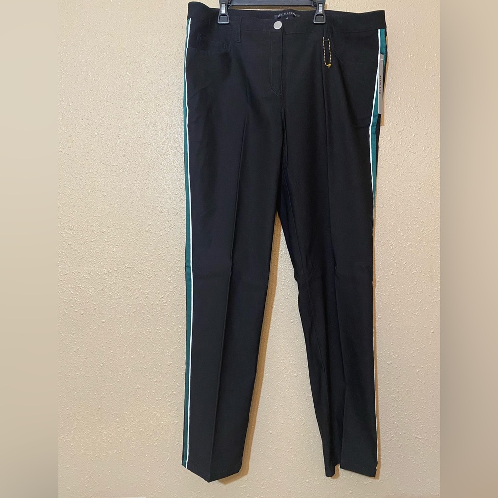 Black pants with green side strip